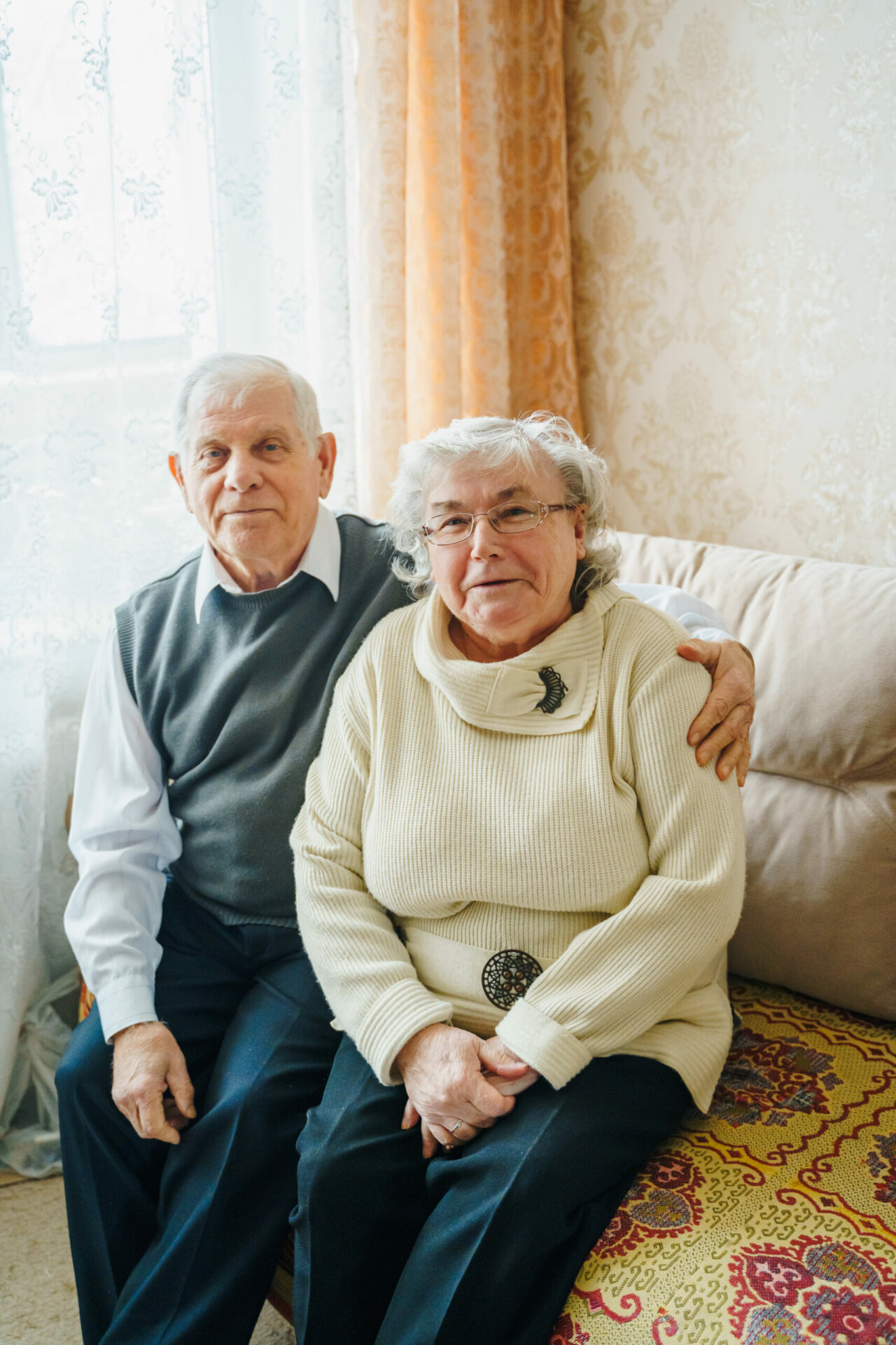 Elderly senior romantic love couple. Old retired man woman together. Aged husband wife in cozy home sweater.Elder hugging kissing people pensioner.Happy family longevity.Tender feelings relationships.