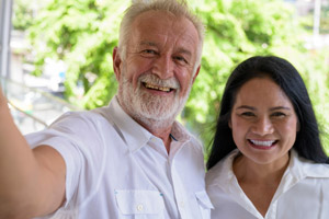 mature-multi-ethnic-couple-happy-and-in-love-while-2023-11-27-05-28-15-utc-scaled